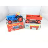 A Crescent toys farm tractor #1809 and a Crescent