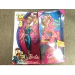 A Toy Story 3 Barbie, a Workin out Barbie, a West End Barbie and a Birthday surprise Barbie all