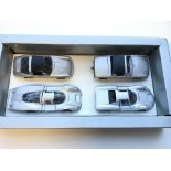 A Marklin gift set contains a Porsche 911T, a VW-P