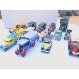 A collection of loose die cast cars