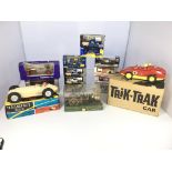 A collection of 10 boxed Nas cars, a Indianapolis