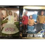 A Grease The movie Barbie, a Star Trek Barbie Gift-set and a Golden Hollywood Barbie all boxed.