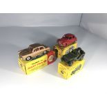 3 Dinky Toys model cars. A Volkswagen 1500 #144, a