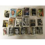 A collection of trading cards in Batman, Captain Scarlett, Thunderbirds, Tarzan, Man From Uncle,