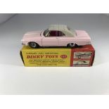 A Dinky Toys Plymouth Fury Convertible #137 with d