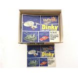 A collection of 40 Dinky catalogues in a trade box