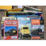 Four boxes containing a collection of books and magazines including model, steam and electric