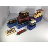 A collection of train models and accessories. A Ho