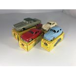 Four Dinky Toys model cars. A Plymouth Fury Conver