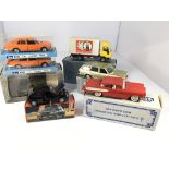 A collection of toy cars including a Ford Fiesta,L