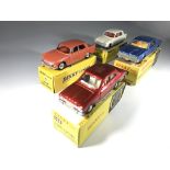 Four Dinky Toys model cars. A 'Dinky Junior' Peuge