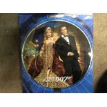 A James Bond Barbie and Ken set boxed.