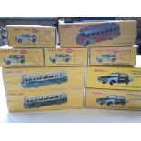 A collection of Atlas Dinky cars, all boxed.