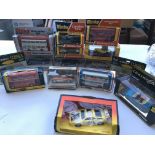 A collection of Dinky and Corgi boxed cars.