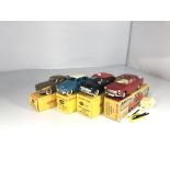 Four Dinky Toys model cars. A "Floride" Renault #5