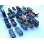 A collection of model railway rolling stock.