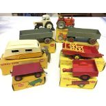 A Dinky Caravan #190,a Land-Rover Trailer #341, a Trailer #429, a Harvest Trailer #320, 2 x Trailer