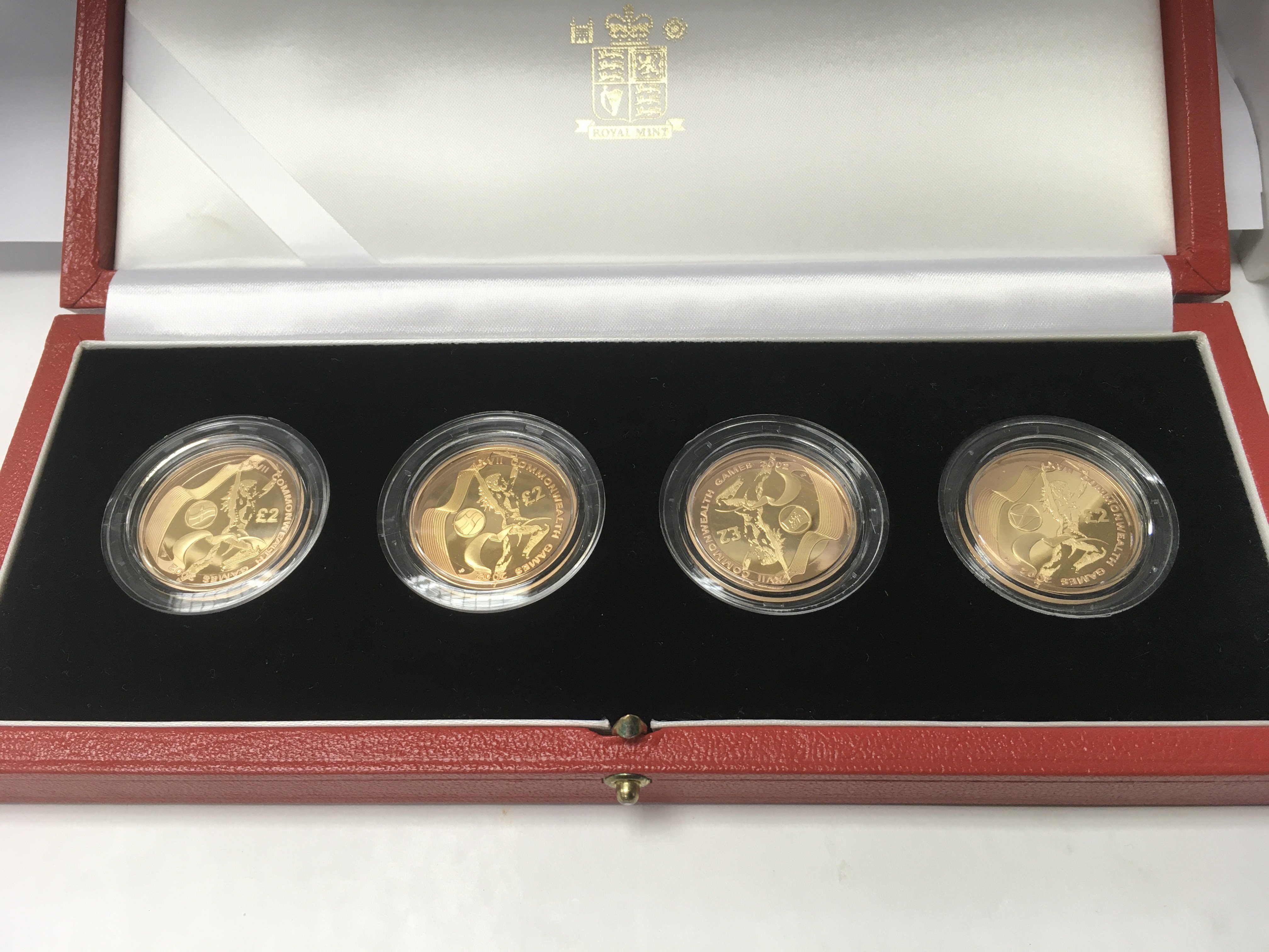 A case set of four gold £2 coins, 2002 commonwealt