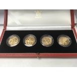 A case set of four gold £2 coins, 2002 commonwealt