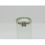 An 18ct white gold ring set with ten diamonds, approx.18ct, approx 4.1g and approx size M-N.