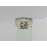 A gents 9ct white gold signet ring set with 16 diamonds, approx .33ct, approx 8.3g and approx size
