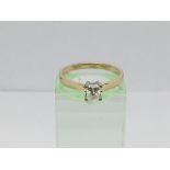 An 18ct gold princess cut solitaire diamond ring, approx.33ct, approx 2.5g and approx size L.