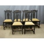 Six 19th/20thC carved oak dining chairs with upholstered drop in seats