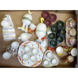 A collection of egg cruets and novelty egg cups including Old Foley, Chintz, Bakelite,