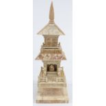 An early 20thC Eastern ivory and bone model of a shrine or temple, 34cm tall