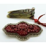 Chinese filigree brooch set with cinnabar lacquer (6cm) and a jadeite locust, length 5cm