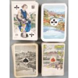 Four packs of German/Swiss playing cards with scenic aces and some local costume court cards, one