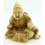 Japanese Meiji period signed ivory netsuke of a seated man with double gourd water bottle, H5.5cm