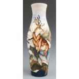 Moorcroft limited edition 28/100 vase decorated in the Highland Stag pattern, designed by Kerry