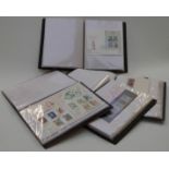 Four albums of first day covers and an album of booklets, presentation packs, miniature sheets and