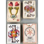 Four packs of C.L.Wust, Frankfurt playing cards, one pack having square corners, double ended