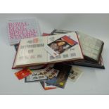 Four stockbooks of mint Great Britain QEII stamps and booklets, high redeemable face value. Also