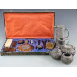 Chinese Yixing pewter bound tea set with various marks to bases, together with a pewter jug engraved