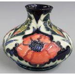 Moorcroft pedestal squat vase decorated with poppies, impressed marks to base JH, R and 1996 date