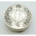 Chinese white metal box with dragon decoration and inset coin, 7.5 x 2.8cm