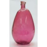 A hand blown cranberry glass bottle vase, 46cm tall