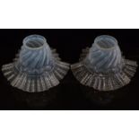 A pair of French opaline glass lamp shades with frilled rims, 17cm in diameter
