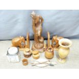 Carved fruitwood figurine, elephant bookends, turned laburnum wood vase, treen items etc