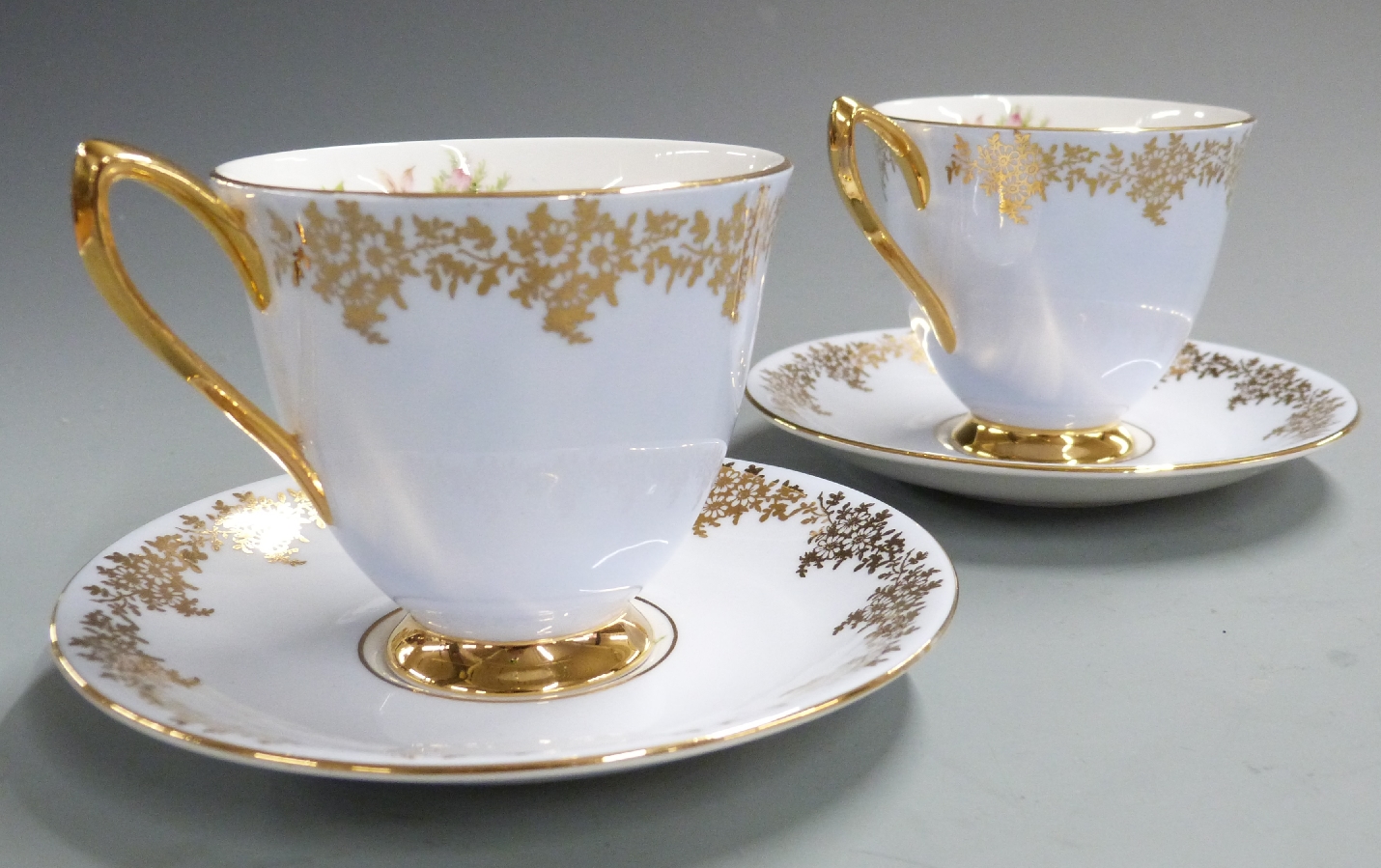 Six Royal Albert cups and saucers with gilded exterior and florally decorated interior - Image 4 of 4