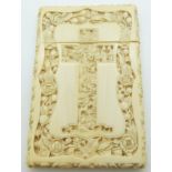 A 19thC Chinese carved ivory card case depicting court scenes inside a cross to each side and a