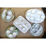 Five egg cruets including Burleigh and porcelain examples probably Spode / Minton, tallest 12cm