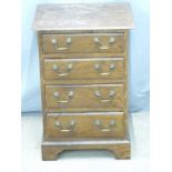 Chest of four drawers with brass handles, raised on bracket legs, W43 x H34 x D64cm