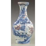 Chinese 19thC blue, white and red vase depicting landscape scene, 32cm tall