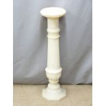 An alabaster jardinière stand in the form of an architectural column, diam 25cm H94cm