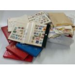 A large quantity of loose stamps and sundry albums and stockbooks of all-world stamps