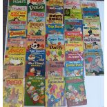 Forty-one Dell cartoon and children's comics comprising Walt Disney's Dumbo, Uncle Scrooge,